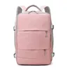 ピンクの女性旅行バックパック滝忌避抗虫のスタイリッシュなカジュアルデイパックバッグ荷物ストラップUSB充電ポート240111