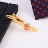 Goldbronze-Krawattenklammer mit eingelegten Champagnertropfen, modische Krawattenklammer aus Zirkon für Herren
