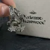 Vivianely Westwoodly Серьги Сладкая прохладная девушка черные серьги букв Сатурн Серьги Ушные пряжки