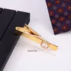 Gold Tie Clip inlaided med vit runda zirkon-mäns high-end presentbindtillbehör personlighet mode manschettknappar