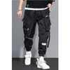 Mince Streetwear pantalons décontractés hommes rubans Harem pantalon de Jogging mâle Slim Fit printemps Cargo pantalon multi-poches femmes pantalon K12 240111