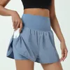Kvinnors shorts Fitnessrum som går löst montering Anti Walking Light Torkande andningsbara och yogabyxor för externt slitage