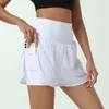 Kvinnors shorts Fitnessrum som går löst montering Anti Walking Light Torkande andningsbara och yogabyxor för externt slitage