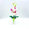 Flores decorativas artificial traça orquídea flor mini bonsai simulado vaso de árvore plantas falso escritório mesa ornamento sala estar decoração casa