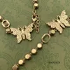 Colgantes moda nueva mariposa llena de collares de colgantes de diamantes cordones de joyería de diseñador y collares con caja