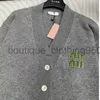 Nya stickade tröjor Designer Women Sweater V-Neck Classic Embroidery Color Contrast Winter Long Sleeve Button Waistcoat tröja