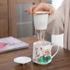 Tazze Creative China Office Bicchieri in ceramica Tazza da tè con coperchio e filtro Tazza da tè con filtro dipinta a mano Tazza da casa