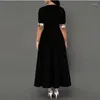 カジュアルドレス女性のファッションベスティドハーフスリーブ格子縞のプリントボタンディテールマキシドレス