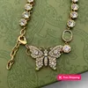 Pendentif Colliers Pendentifs de mode Nouveau papillon plein de diamant Pendentif Designer Bijoux LACETS et colliers avec boîte GY5X