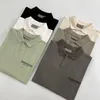 Été Hommes Designer Polo T-shirt Hommes T-shirts Luxe Alphabet Numérique Pur Coton Femmes Polos Frottis Thé T-shirts Sport Casual Polyvalent Lâche Gros Hommes Tshirt