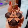 Fashion Bunny Design Key Chains Ring Pompom Ball Rabbit Bag Pendant Charm Keyring Buckle Gift Jewelry Accessories Pu Leather Brown Flower