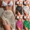 Kvinnors badkläder Kvinnor virkning baddräkt täcker ihåliga stickade fisknät tofsar se-genom strand sexig mini kjol split sarong 10cf