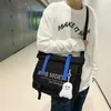 ファッションハイキャパクトイビンテージバックパック男の子用ギルズカジュアルメッセンジャークロスボディバッグのための日本の多機能学校バッグ240112