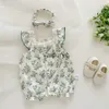 Rompers Nieuwe zomerbabymeisjes rompreren een peuter peuter zoete groene bloemen jumpsuit met haarband met uitloper outfits H240429