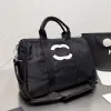 AAAA Designer torba męska mężczyźni Kobiety mody projektantka torba podróżna duża torebka metalowa wisiorek na płótnie skórzane jedno ramię w torbie podróżnicze