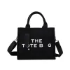 Sıradan mini tuval omuz çantası yüksek kapasiteli çanta kadın çanta tasarımcısı çanta siyah tote çanta crossbody lüks moda alışveriş çantası mj 2 boyut