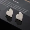 Boucles d'oreilles à clous pour femmes, ne se décolore pas, à la mode, petit cœur, vente en gros, petits bijoux coréens, 2024