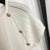 Brand Women T Shirt Luksusowy przycisk mody pusty z krótkim rękawem Knifowanie wysokiej jakości damskich ubrania Górna odzież 13 stycznia