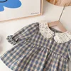 Rompers Baby Vêtements Toddler Girls One Piece Plaid Body Body Long Manchet tenue H240426