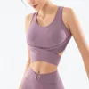 Yoga skörd toppskönhet tillbaka sexig designkänsla bågklänning kvinnor solid sport bh öppen träning träningstank 240113