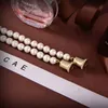 Colliers d'écouteurs de perles pour femmes avec timbre, chaîne de pull de luxe, fille, Couple, boutique, cadeau, boîte d'emballage, bijoux de haute qualité, nouvelle collection