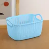 wholesale solid color cabinet storage basket, imitation rattan woven hollow plastic storage basket, handle