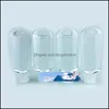 Verpakkingsflessen 50 ml Petg lege alcohol hervulbare fles met sleutelhangerhaak Doorzichtig plastic handdesinfecterend middel voor reizen Drop Delivery Off Othig