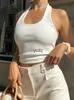 Kvinntankar Camis White Halter Sexig Baless Tank Tops för kvinnor Streetwear 2024 Ärmlös Ribbed Knit V Top Croped Feminoyolq