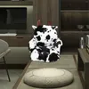 Poduszka krowa opuszcza fotela fotela
