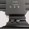 Boutique Black Heart Ear Stud Designer Charm örhängen Kvinnor Eleganta lyxsmycken med låda Klassiska presentörhängen med stämpel Nya högkvalitativa smycken