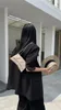 Kvällspåsar toppskikt kohud kvinnors väska 2024 origami känna handgrepp kedja mini timglas enskild axel crossbody
