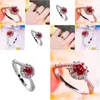 Den klassiska PT950 Platinum Twisted Arm Diamond Ring for Women S925 Dazzling Group med Mosan Pigeon Red Drop Delivery DHXAQ