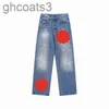 Designer-Herrenjeans, High-Luxus-Street-Lila, bestickte Herrenhose, übergroße Rip-Patch-Loch-Jeans mit geradem Bein, Denim-Hip-Hop-Street-Slim-Hose SQL9