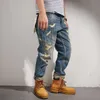Outono remendo jeans magro reto masculino americano durão cara retro calças casuais 240113