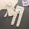 Tracce femminile marchio marca in velluto in tessuto tracce pantalone abito in velluto da donna con cappuccio e pantaloni da due pezzi set da due pezzi