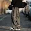 Męskie dżinsowe spodnie Męskie spodnie Streetwear szeroka noga z kreskówkową kwiatową haftą elastyczną talię głębokie kieszenie modne luźne dla modnych