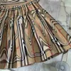 ファッションガールドレスピュアコットンベイビースカートサイズ100-160夏の格子縞のプリンティングチャイルドドレスデザイナーホワイトラペルキッズフロックjan10