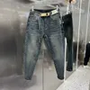 Jeans de diseñador para hombres Primavera Verano Agujero Slim Fit Hombres Mujeres Letras impresas Retro Hip Hop Street Parkour Pantalones deportivos casuales Pantalones para correr