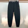 Moda masculina designer jeans primavera verão buraco fino ajuste letras masculinas e femininas retro rua casual sweatpants calças de jogging