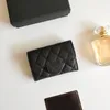 Luxe C Créateur de mode Femmes Porte-cartes Fold Rabat Modèle classique Caviar Agneau Gros Femme Noire Petit Mini Portefeuille Couleur Pure Cuir Pebble avec boîte