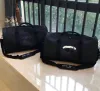 Wysokiej jakości luksusowa moda mężczyźni kobiety podróżują torby marki marki torebki bagażowe duża pojemność sportowa torba na jadą 45*25-21 cm