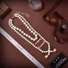 New Womens Pearl Earphone Necklaces With Stamp Luxury Sweater Chain Girl Couple Boutique Gift Necklace Box Packaging High Quality Jewelry