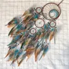 Högklassig turkosa Life Tree Dream Catcher med färgglad fjäder vindklocka väggdekoration, gränsöverskridande varmförsäljning hänge