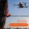 Le GPS drone avec caméra HD, évitement des obstacles, positionnement de débit optique, combat de trajectoire, photo de discussion sur geste, combat surround, un retour en clic, Noël, Halloween.