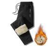 Inverno sweatwear homens de pelúcia grosso velo sweatpant lambswool calças térmicas calças casuais à prova dwindproof água à prova de vento calças de algodão quente 240112