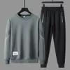 2PCSSET MEN AUTURN WINTER CARICORS SPORTSUIT ONECK LEGS SLEEVE SWEATSHIRT TOPS ELASTIC WAIST DRAWSTRING JOGGER PANTSセット240112