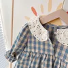 Rompers Baby Vêtements Toddler Girls One Piece Plaid Body Body Long Manchet tenue H240426