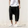 Herrbyxor män drop crotch byxor vikande trendstil oregelbunden soild baggy beskuren för man sommarficka ropa para hombre