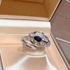 2024 Pierścień nowego projektanta szmaragdowy węża pierścień węża kolczyki na głowę wysokiej jakości 18 -karatowa biżuteria
