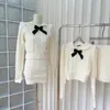 ワークドレスハイエンドニットセーターカレッジスタイルスーツ女性春の気質セクシーなスカート2ピースセット韓国語